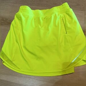 Lululemon shorty Hot high rise run skirt/skort. Fun bright yellow. NWOT